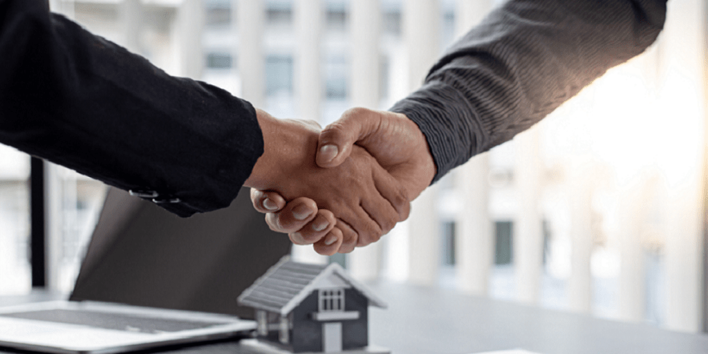 two people shaking hands